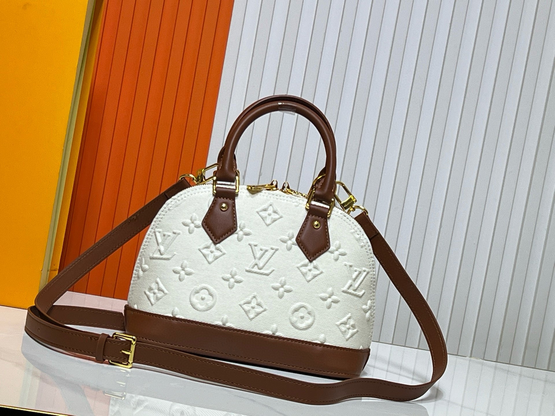 Louis Vuitton Alma BB in Bicolor Monogram Empreinte Leather (Cream & Cognac)