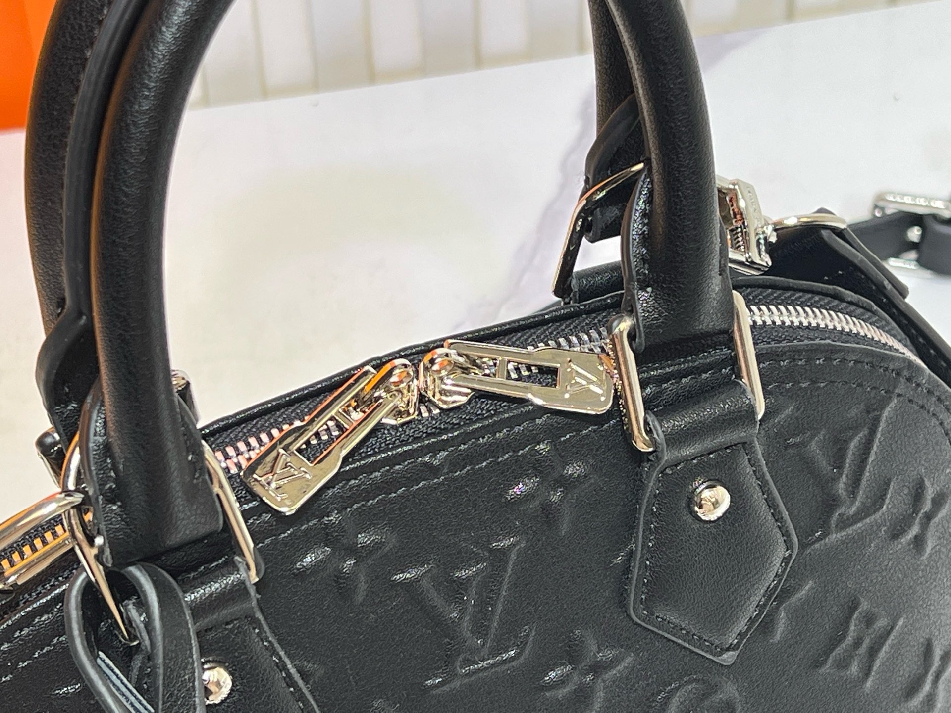 Louis Vuitton Alma BB – Monogram Empreinte Leather in Black