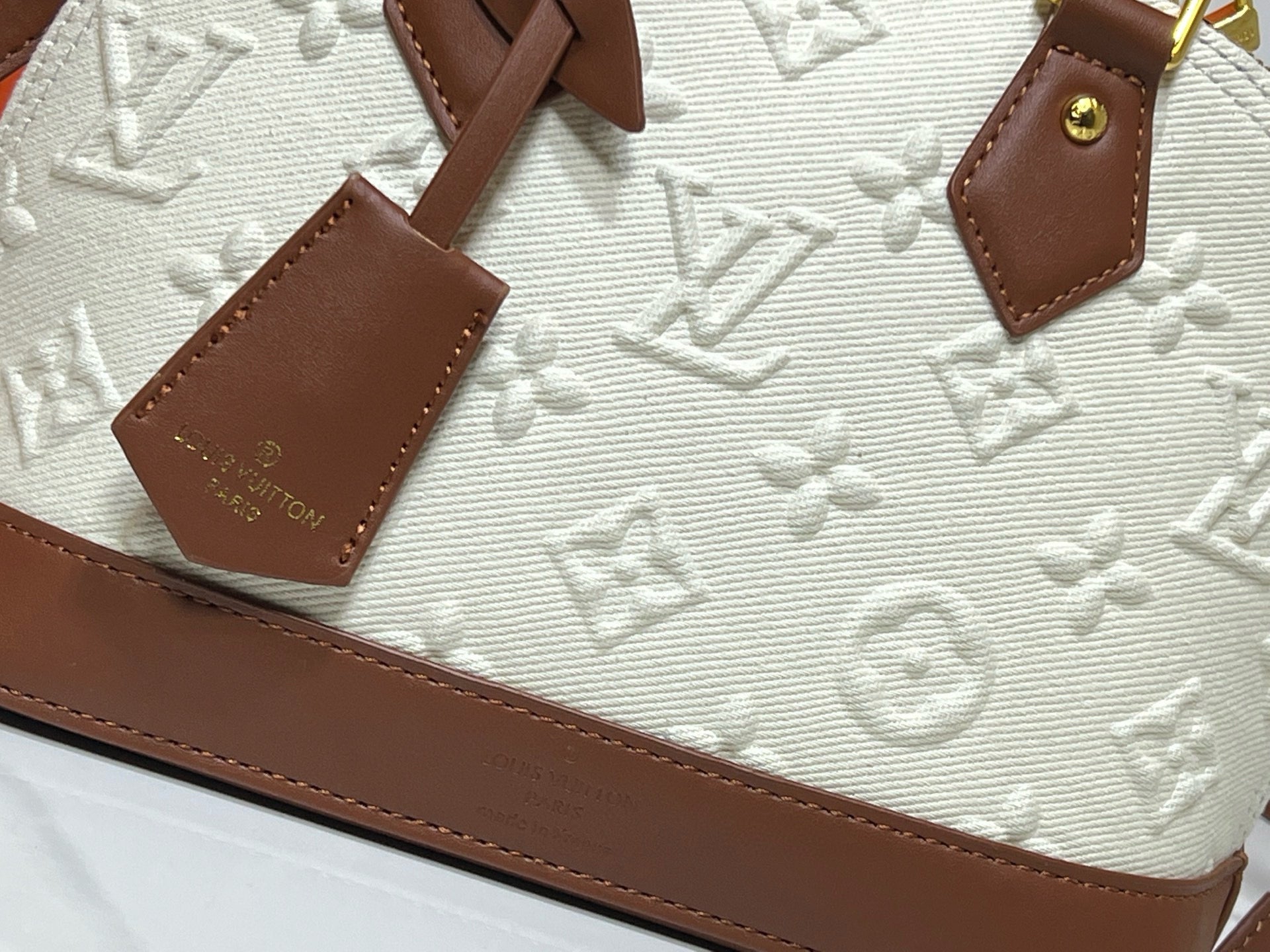 Louis Vuitton Alma BB in Bicolor Monogram Empreinte Leather (Cream & Cognac)