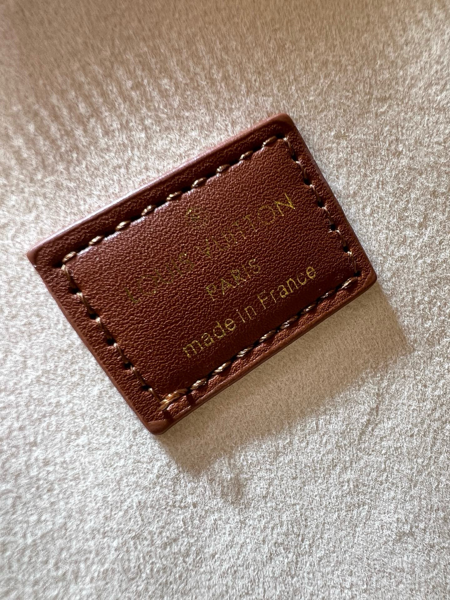 Louis Vuitton Alma BB in Bicolor Monogram Empreinte Leather (Cream & Cognac)