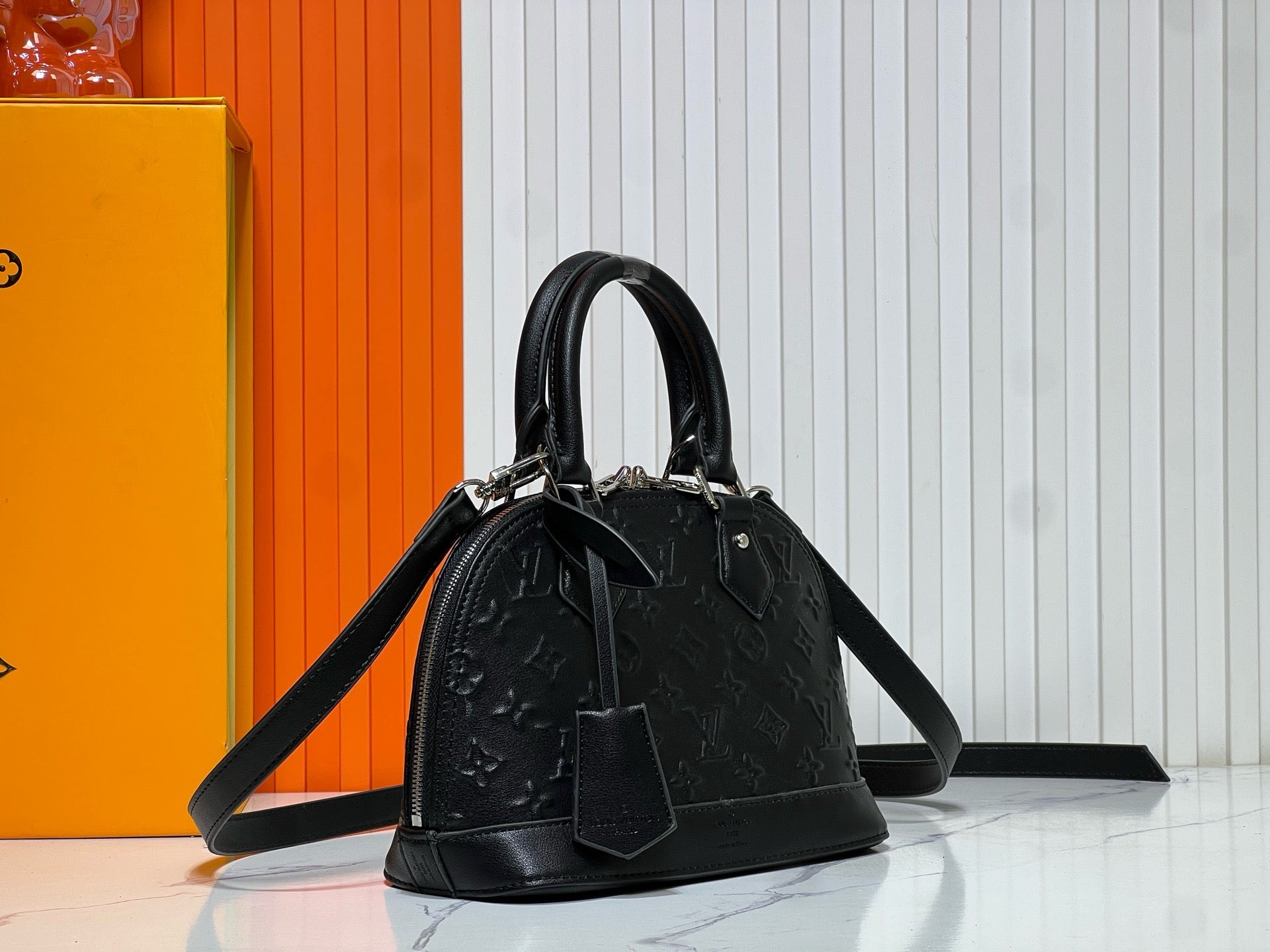 Louis Vuitton Alma BB – Monogram Empreinte Leather in Black