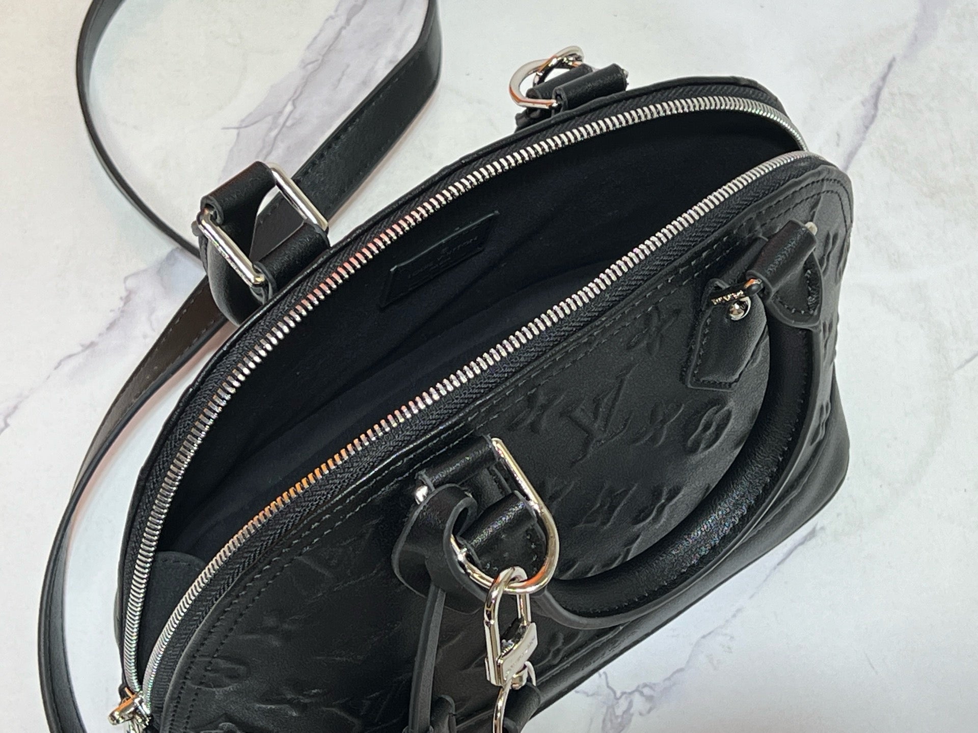 Louis Vuitton Alma BB – Monogram Empreinte Leather in Black